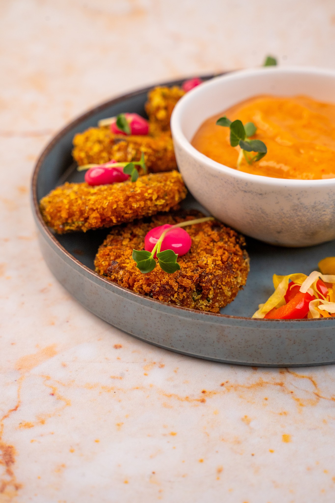 Auri chef-crafted plate with vegetables and curry