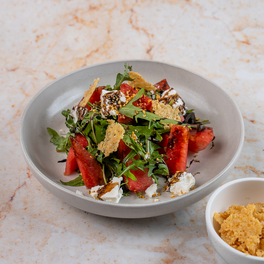 Auri salad with watermelon, greens and cheese